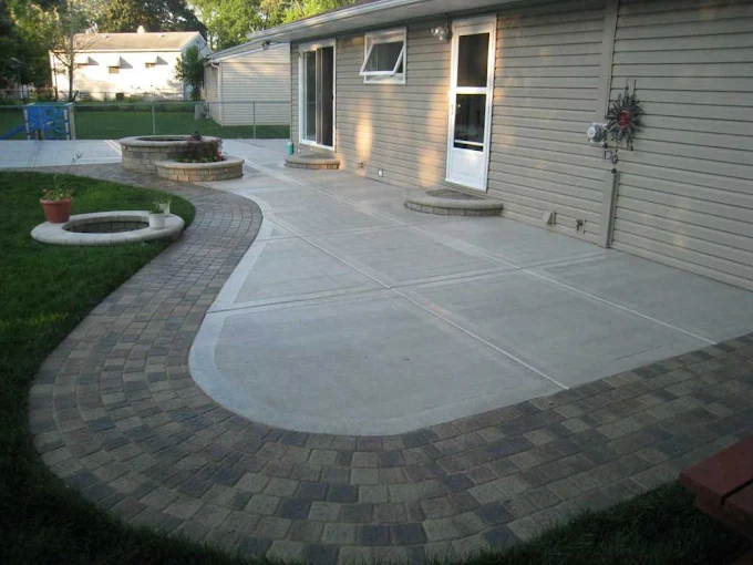 Concrete patio with paver border
